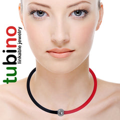 Model wearing two TUBINO SPORTIVO BRACELETS linked together to wear as black red choker necklace, luxurious hypoallergenic synthetic rubber with nickel-free metal links, easily cut to size, Made in Italy